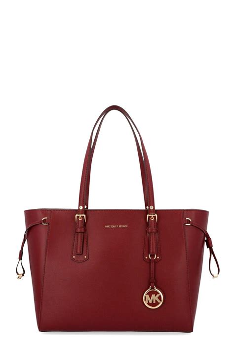 large burgundy michael kors leather handbag|burgundy Michael Kors tote.